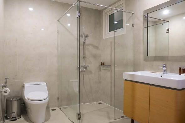 room interior and bathroom of THE EMPIRE PLACE SATHON