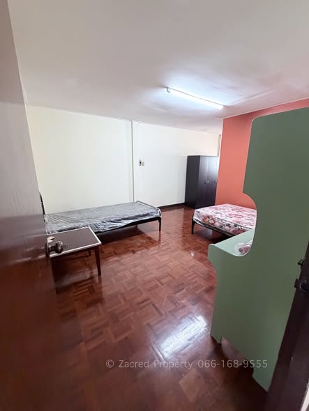 bedroom of The Exclusive Townhome