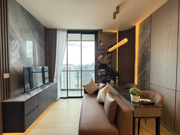 bedroom and living room of THE EXTRO Phayathai-Rangnam