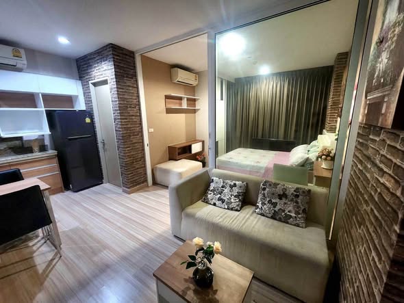 bedroom and bathroom of The Hotel Condominium