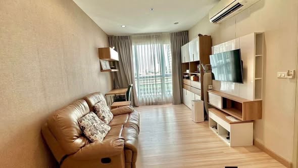 bedroom and living room of The Hotel Condominium