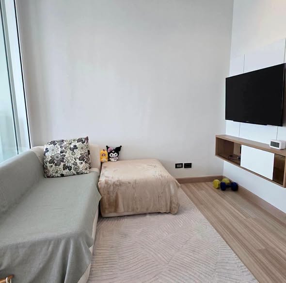 living room and bedroom of The Hotel Condominium