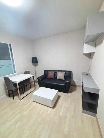 bedroom and living room of The Leaf