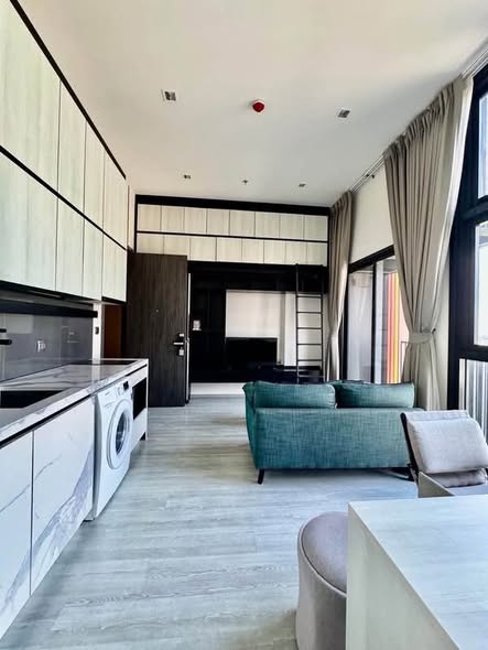 living room and room interior and kitchen of THE LINE Sukhumvit 101