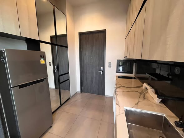 room interior and kitchen of THE LINE Sukhumvit 101