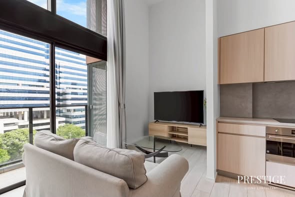 living room of The Lofts Silom by Raimon Land