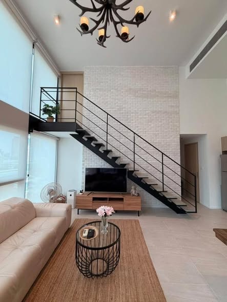 living room of The Lofts Silom by Raimon Land