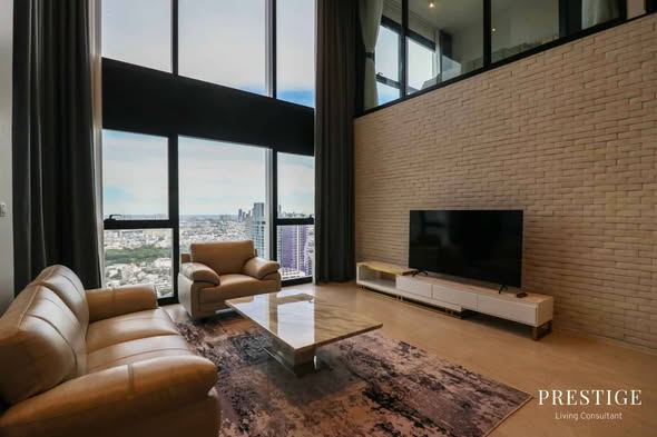 living room of The Lofts Silom by Raimon Land