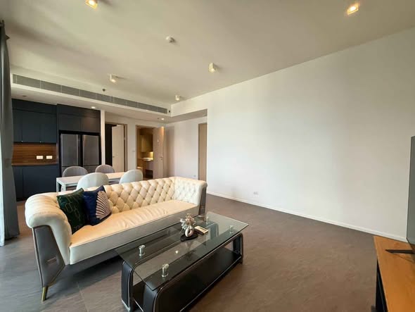 living room and bedroom of The Lofts Silom by Raimon Land