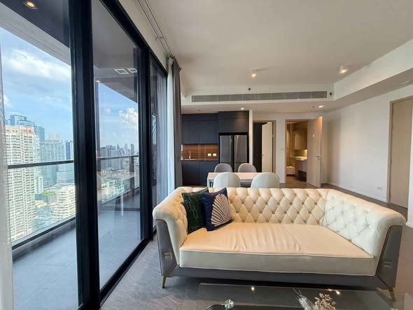 living room and bedroom of The Lofts Silom by Raimon Land