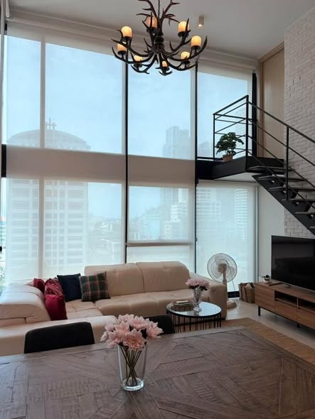 living room and room interior of The Lofts Silom by Raimon Land