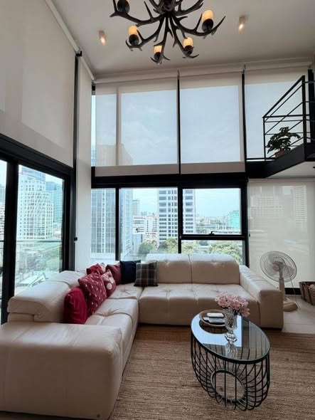 living room and room interior of The Lofts Silom by Raimon Land