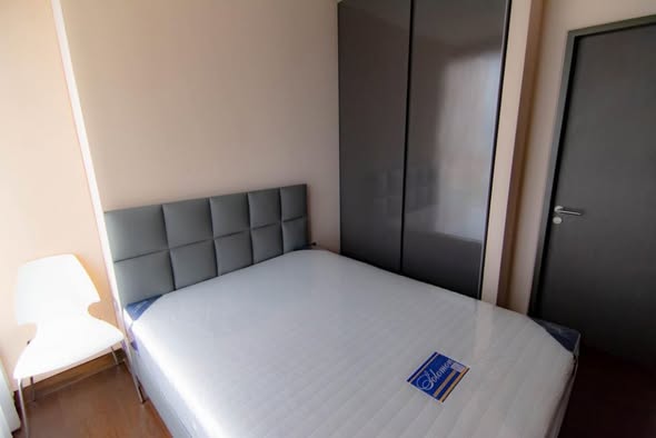bedroom of The Lumpini 24