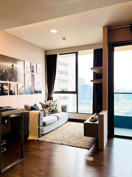 bedroom and living room of The Lumpini 24