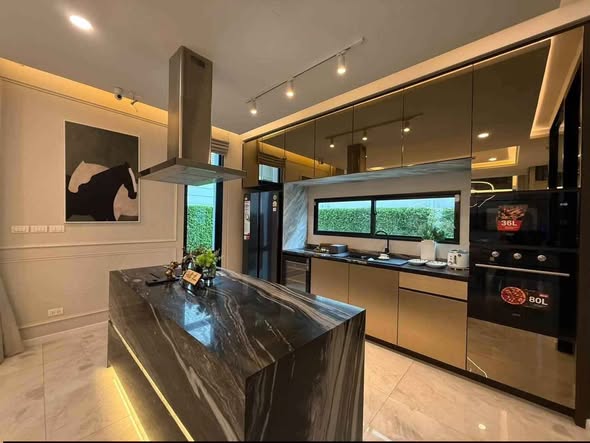 living room and kitchen of The Master Reflexion @BTS Onnut