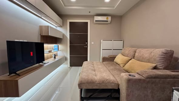 bedroom of The Metropolis Samrong