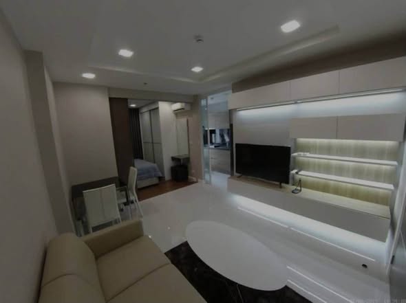 bedroom of The Metropolis Samrong