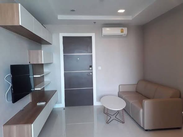 bedroom of The Metropolis Samrong