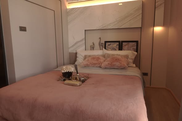 bedroom of The Moment Ratchada 19