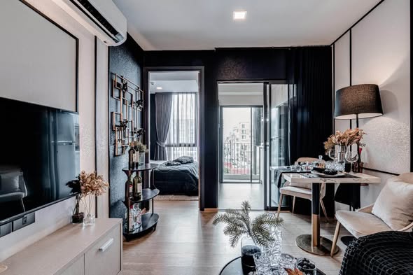 bedroom and living room of The Moment Ratchada 19