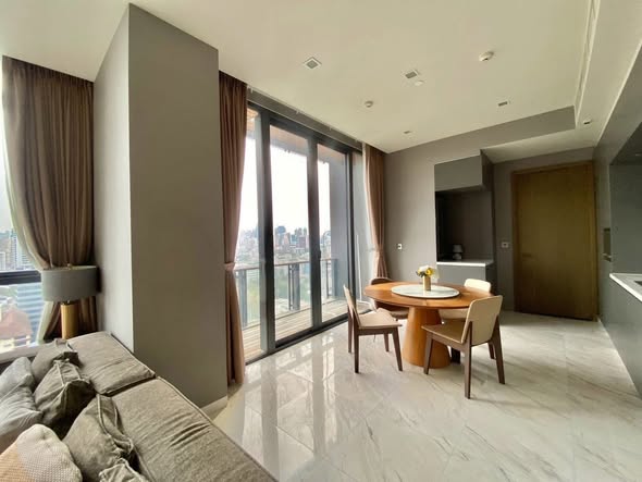 bedroom and living room of The Monument Thong Lo