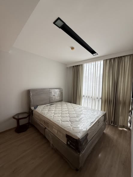 bedroom of The Nest Ploenchit