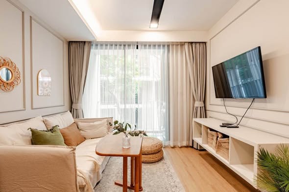 bedroom and living room of The Nest Ploenchit