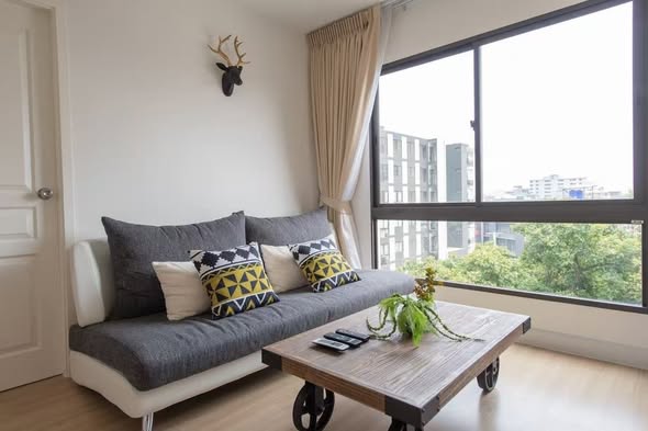 living room and bedroom of The Nest Sukhumvit 22