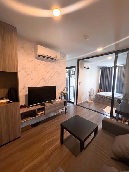 bedroom and living room of The Origin Ramintra 83 Station