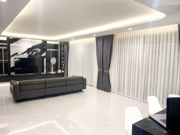 bedroom and living room of The Palm Krungthepkreetha – Wongwaen