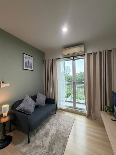 living room and bedroom of The Parkland Srinakarin Lakeside