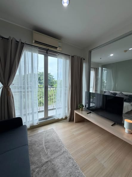 living room and bedroom of The Parkland Srinakarin Lakeside