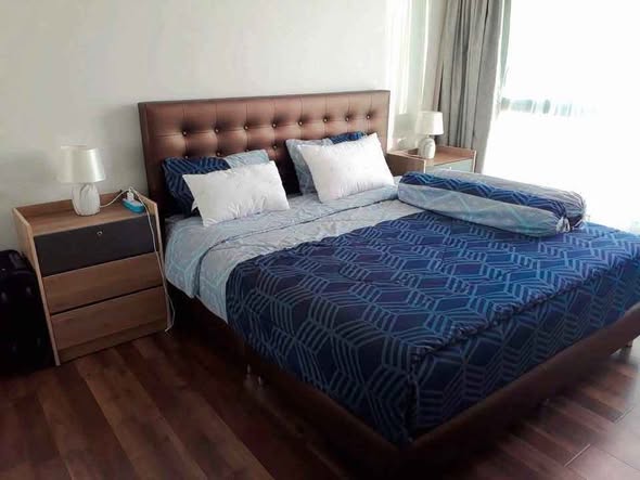 bedroom of The Peak Towers