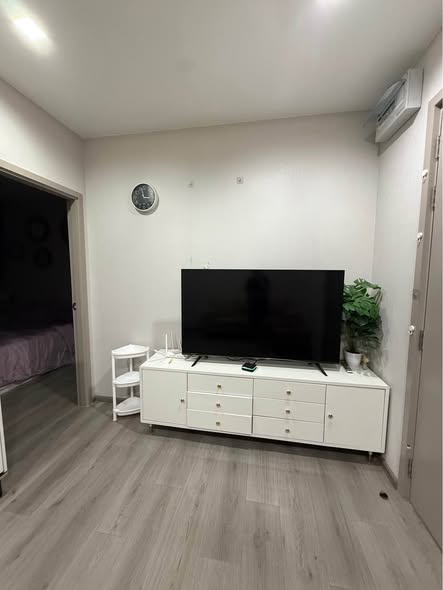 bedroom and living room of The Politan Aqua