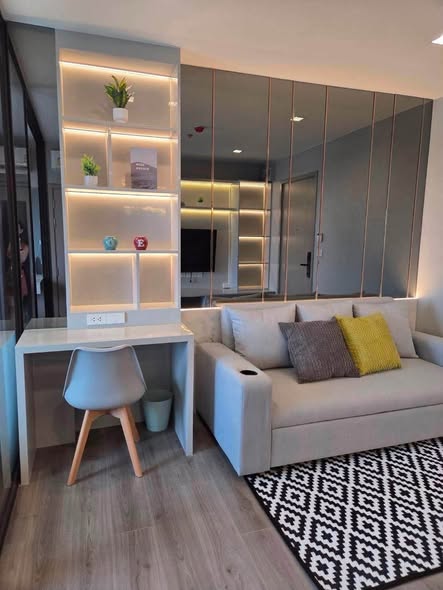 living room and bedroom of The Politan Aqua