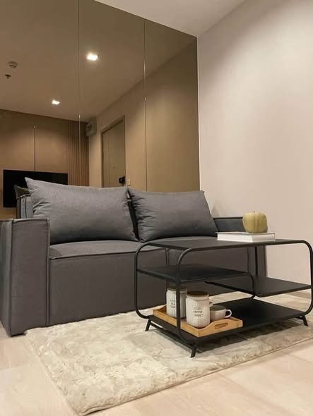 bedroom and living room of The Politan Rive