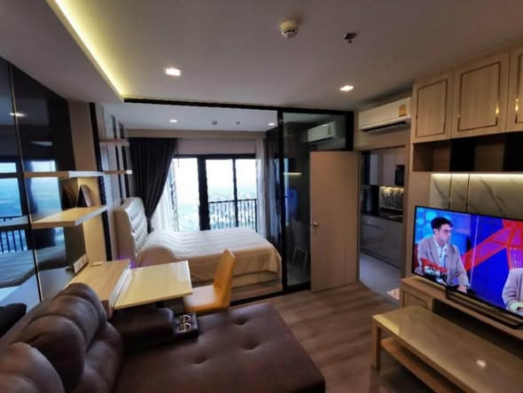 living room and bedroom of The Politan Rive
