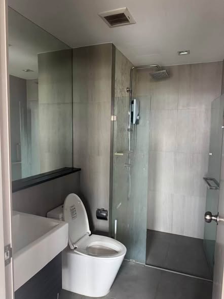 room interior and bathroom of The Politan Rive