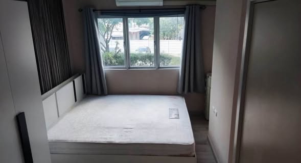 bedroom of The Privacy Ladprao – Sena