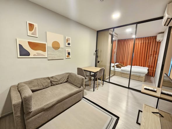 living room and bedroom of The Privacy S101