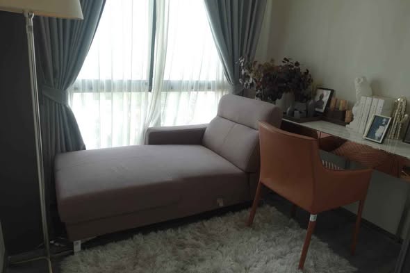 living room and bedroom of The Rich Sathon-Taksin