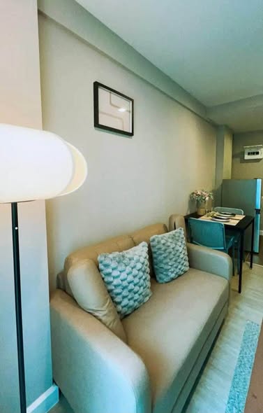 bedroom and living room of The River Condominium
