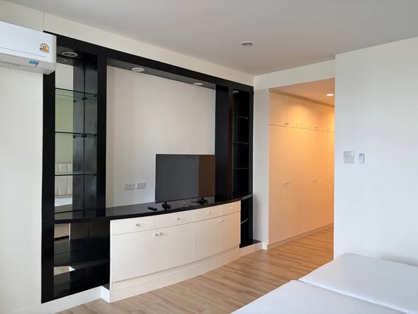 bedroom and room interior of The River Condominium