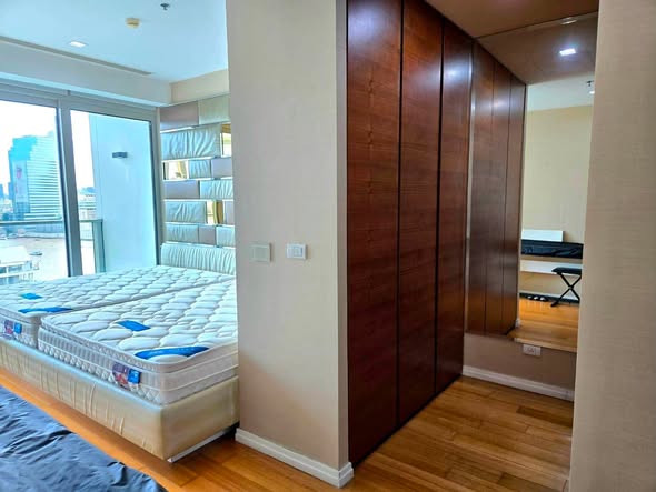 bedroom and room interior of The River Condominium