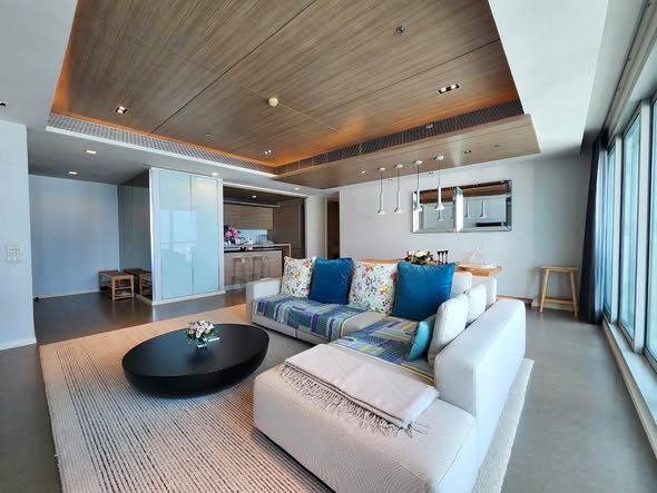living room and bedroom of The River Condominium