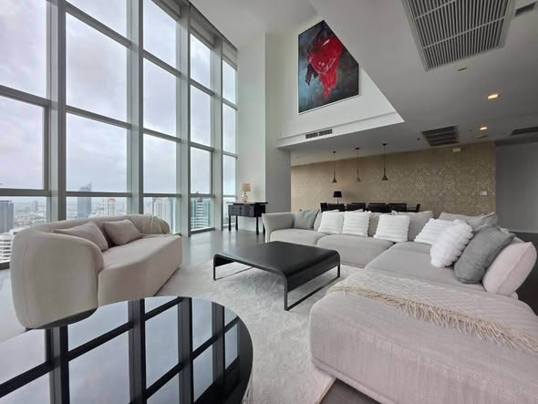 living room and bedroom of The River Condominium