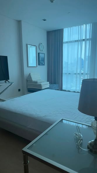 bedroom of The Room Charoenkrung 30 Condominium