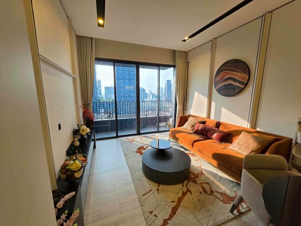 bedroom and living room of The Room Phaya Thai