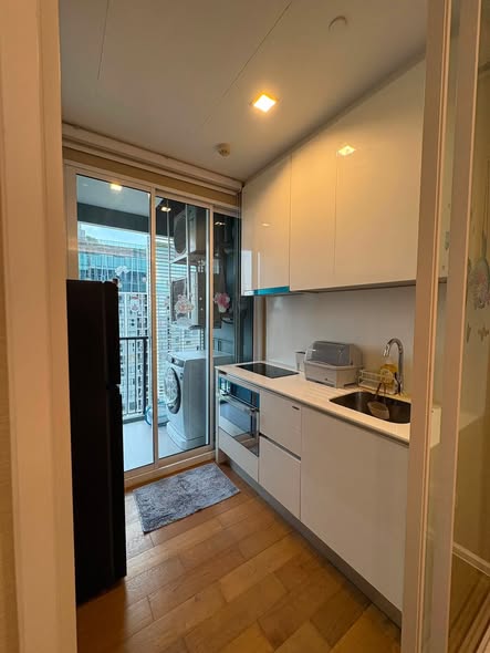 room interior and kitchen of The Saint Residences