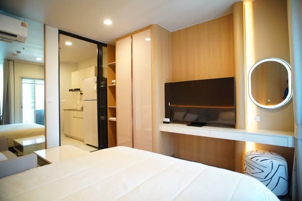 bedroom and room interior of The Strand Thonglor